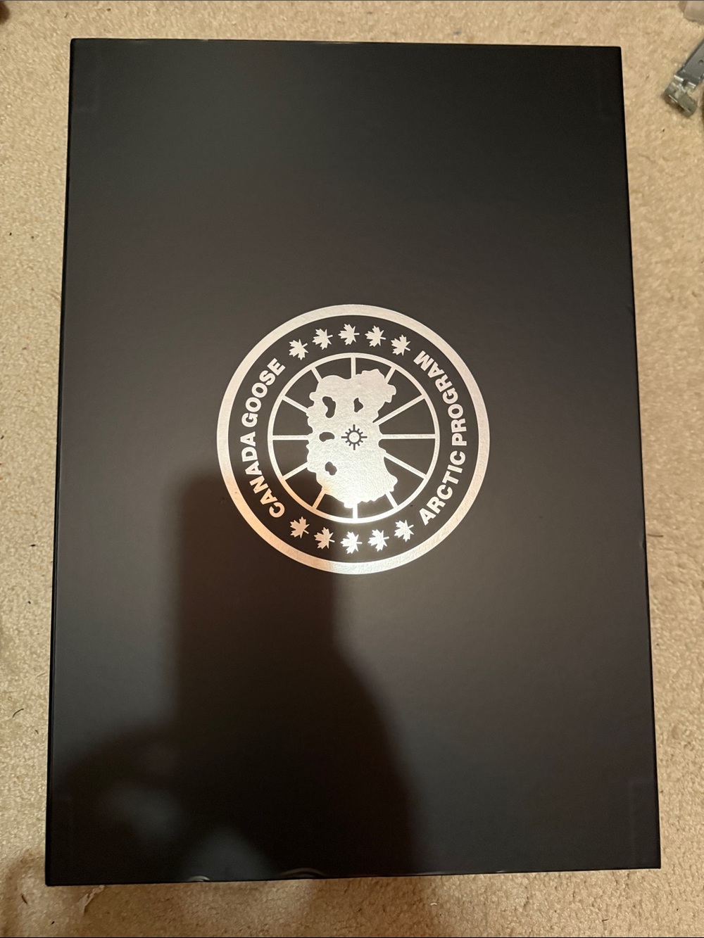 Canada Goose Black Box with Silver Emblem